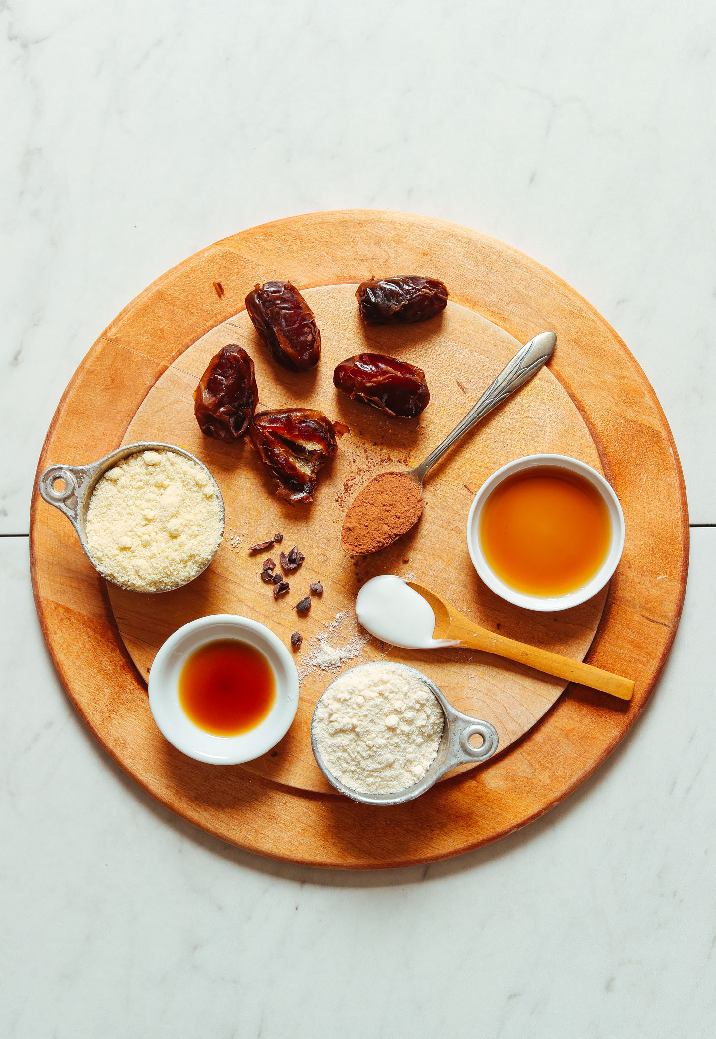 Cutting board displaying ingredients for making our Fudgy Vegan Chocolate Cake Bites recipe