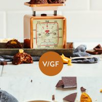 Plate and vintage scale filled with our Peanut Butter No-Bake Cookies recipe