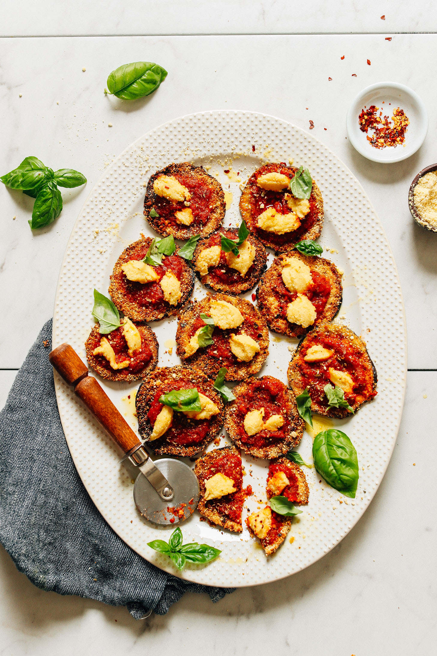 Platter of mini eggplant pizzas