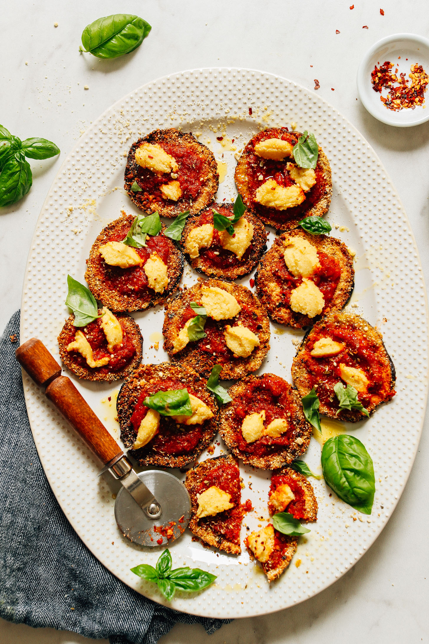 Platter of Mini Eggplant Pizzas for a healthy gluten-free vegan appetizer