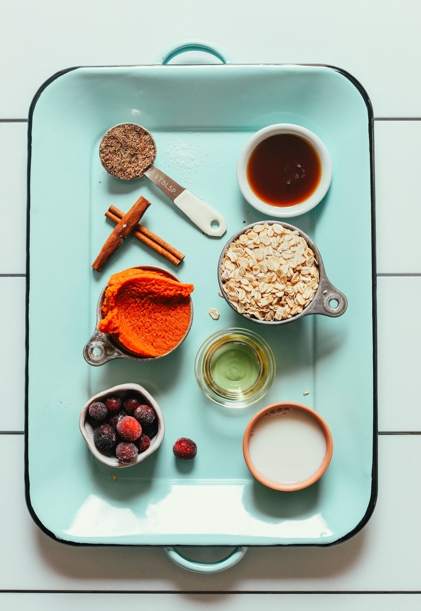 Tray filled with ingredients for making Pumpkin Baked Oatmeal with Cranberries