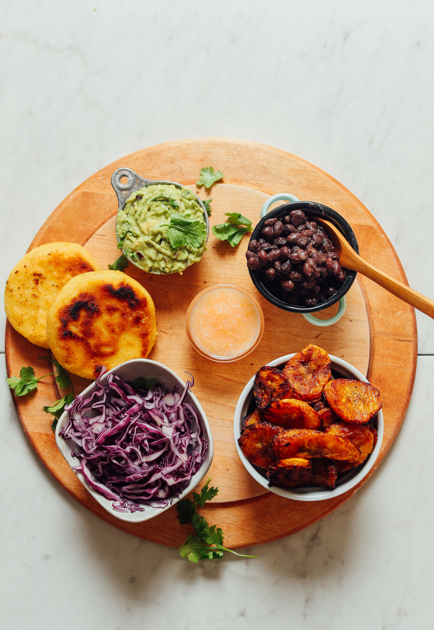 Tray of ingredients for making gluten-free Vegan Arepa Sandwiches