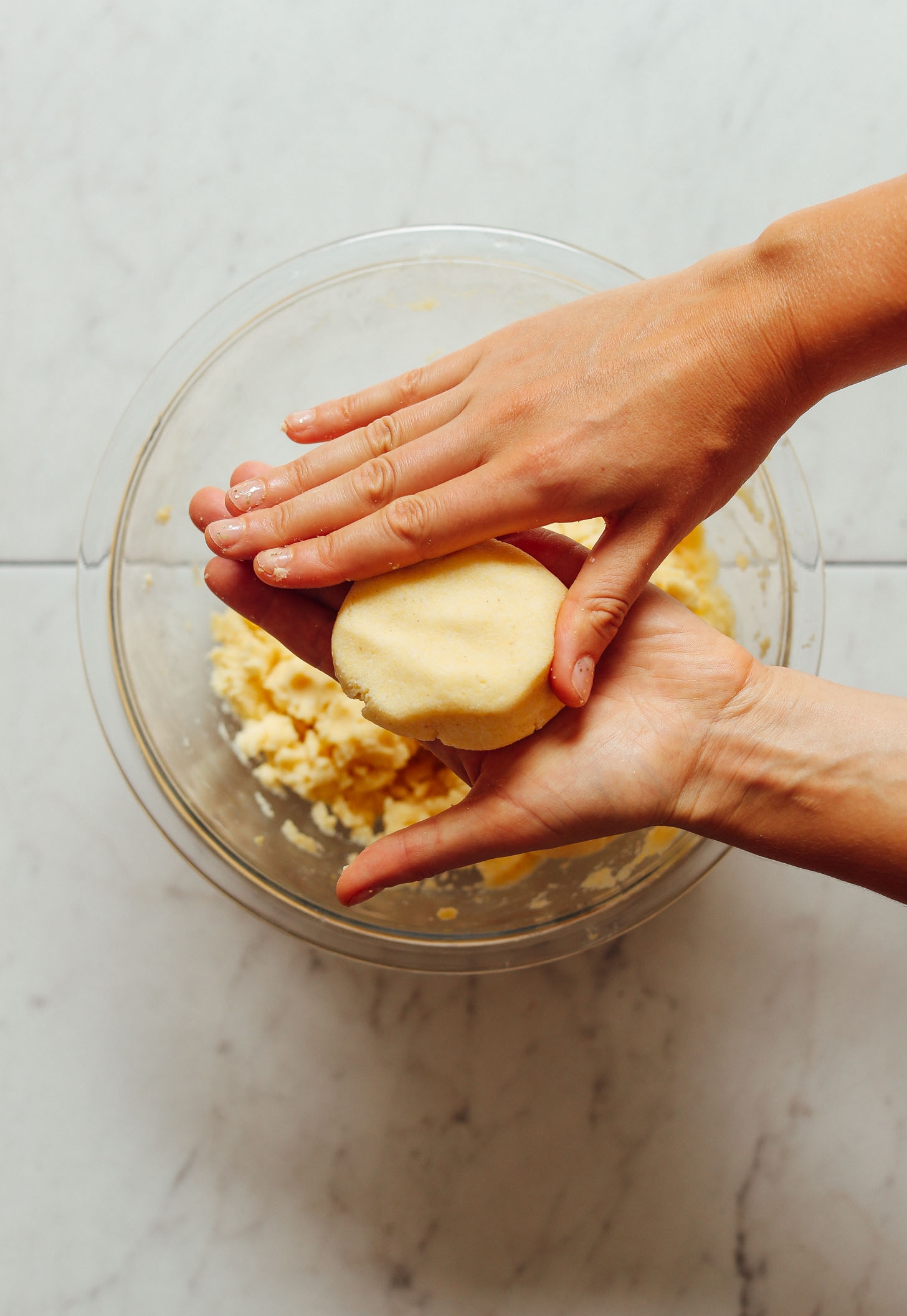 Shaping ball of arepa dough with my hands