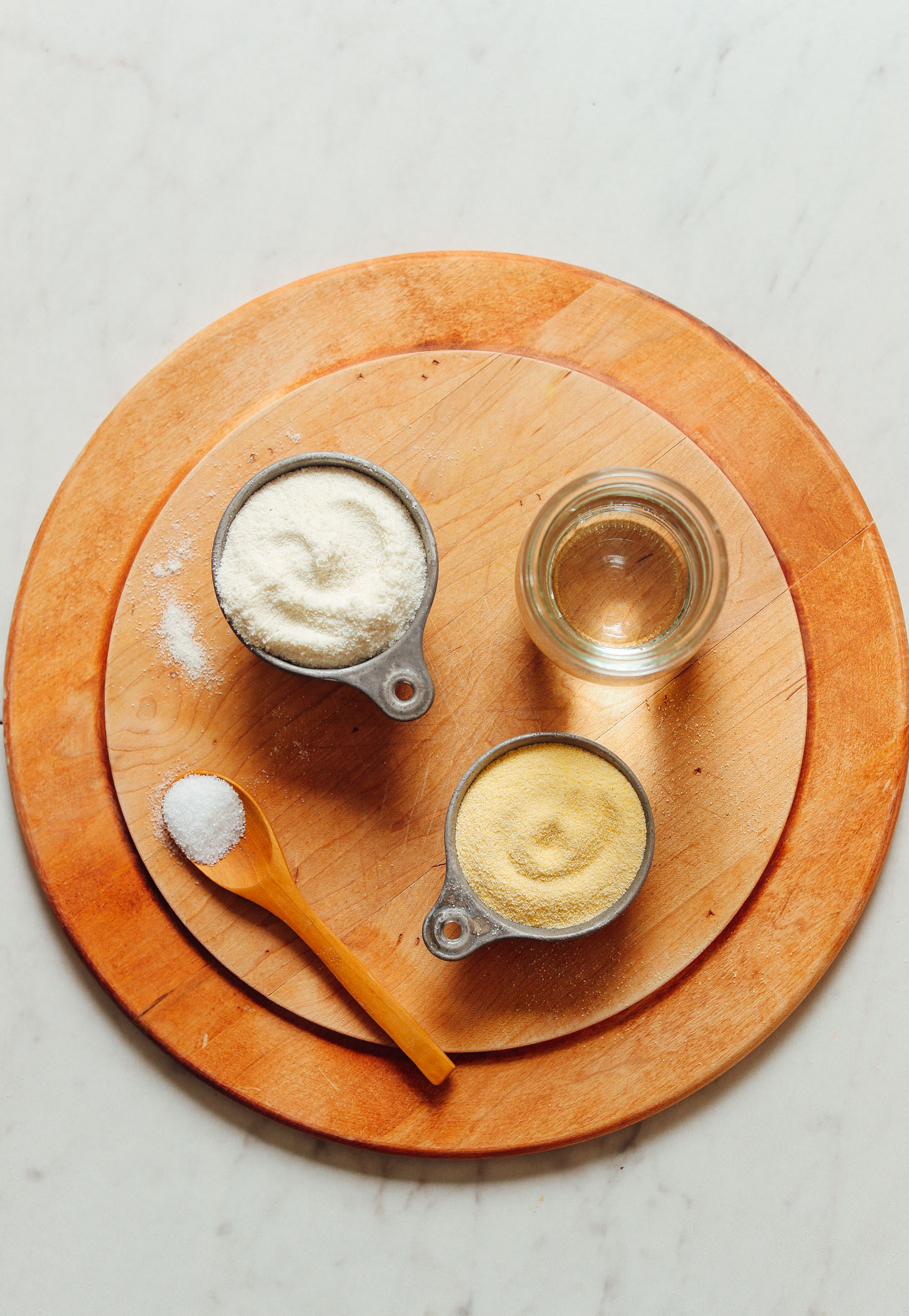 Tray with areparina, water, and salt for making simple homemade Arepas