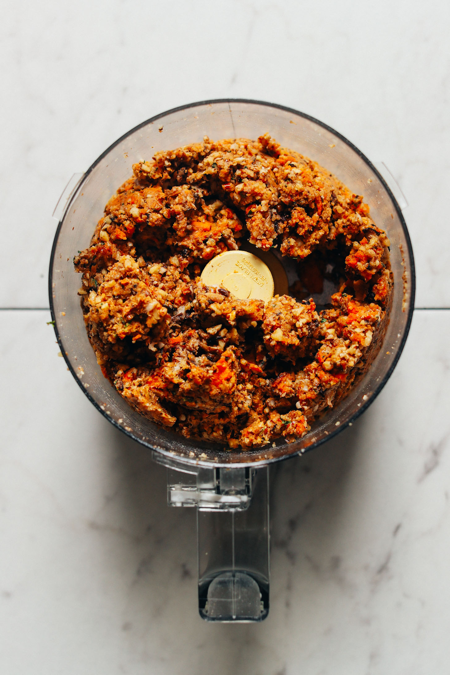 Food processor with freshly blended dough for Vegan Lentil Meatloaf