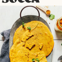 Platter of fluffy curried socca also known as chickpea bread
