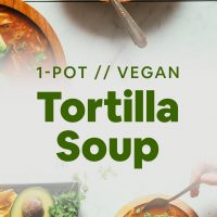 Bowls of Vegan Jackfruit Tortilla Soup topped with avocado and cilantro