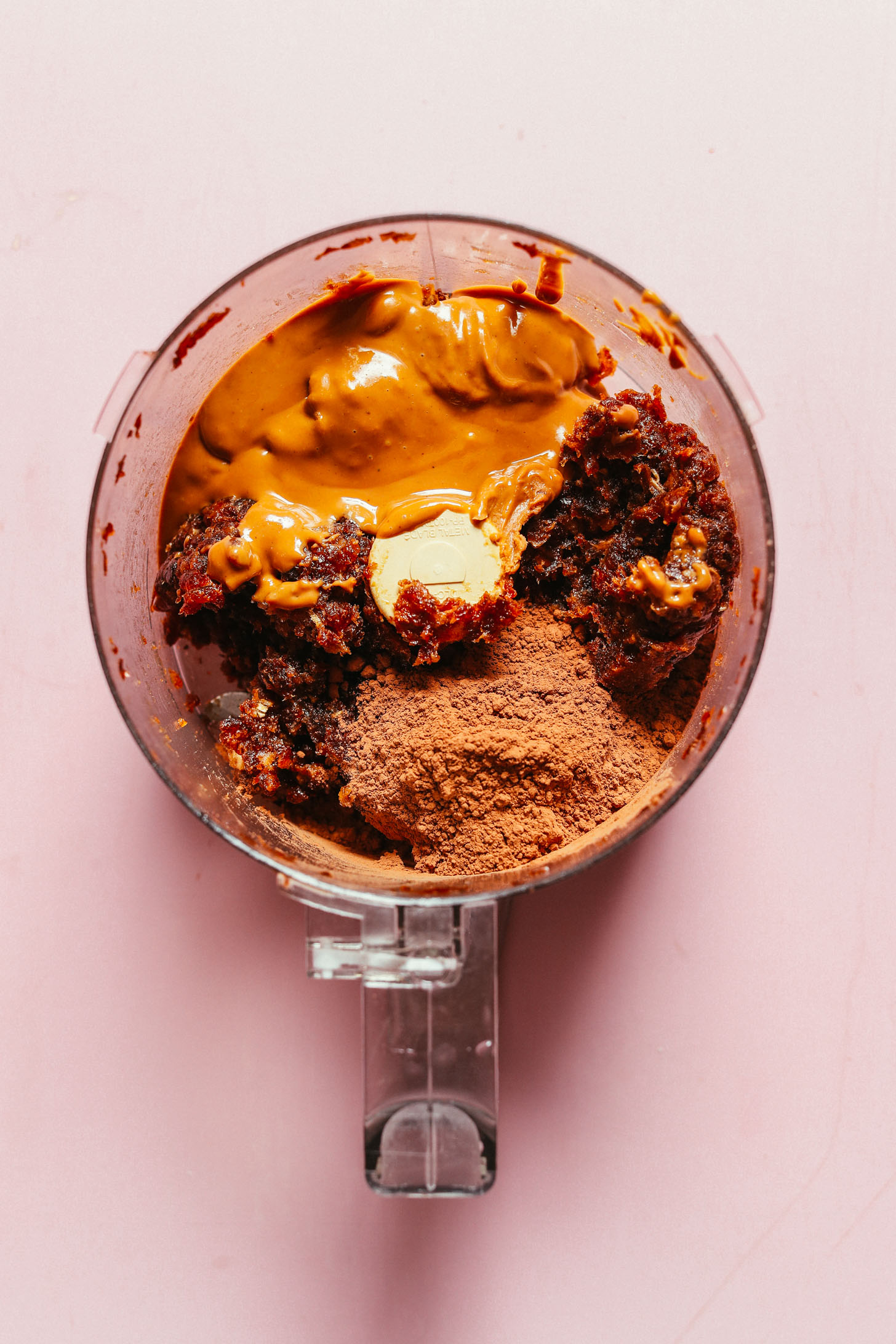 Food processor with ingredients for making easy gluten-free vegan brownies