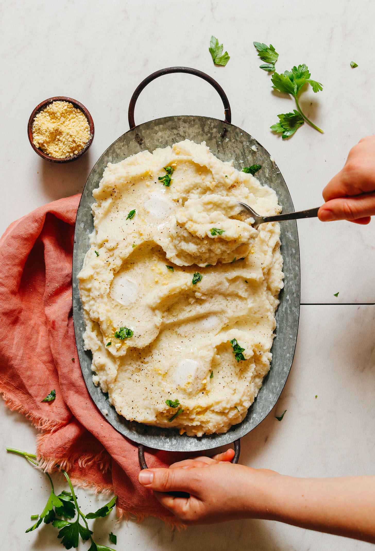 Tray filled with a batch of our creamy vegan Garlic Mashed Cauliflower