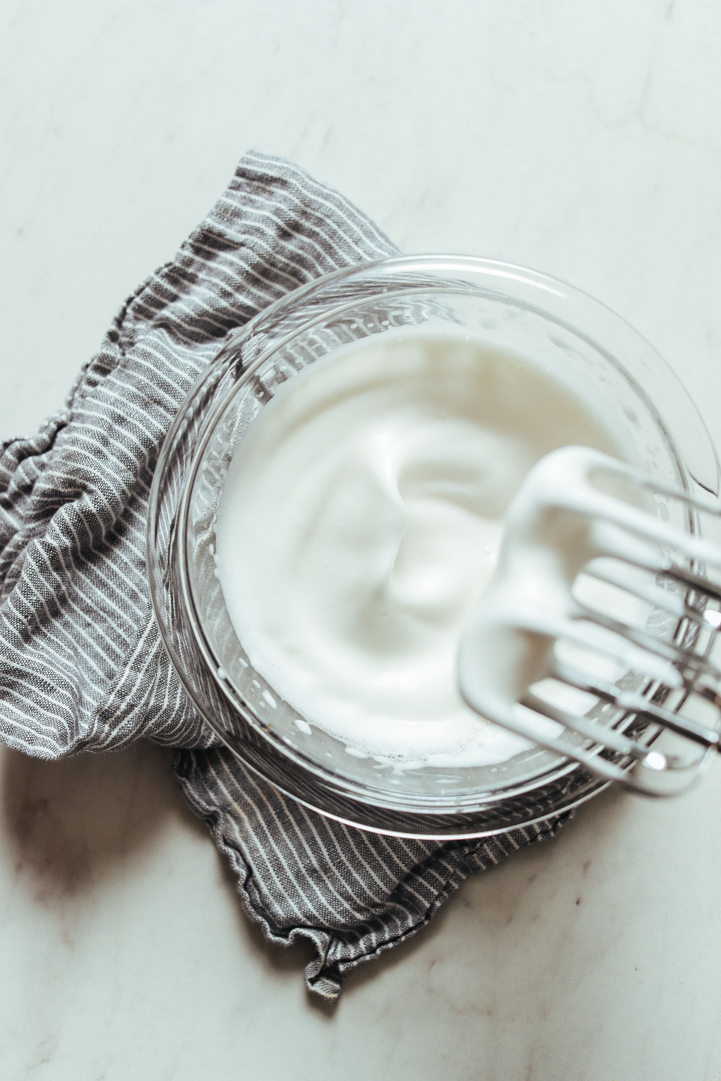 Batch of freshly whipped aquafaba for delicious vegan gluten-free chocolate chip cookies