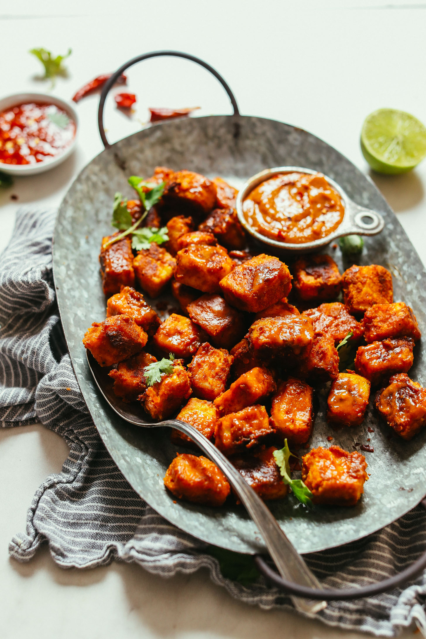 Platter filled with Quick & Easy Peanut Tofu with homemade peanut sauce