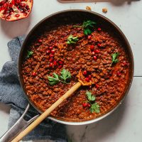 Skillet filled with a batch of our Vegan Lentil Fesenjan