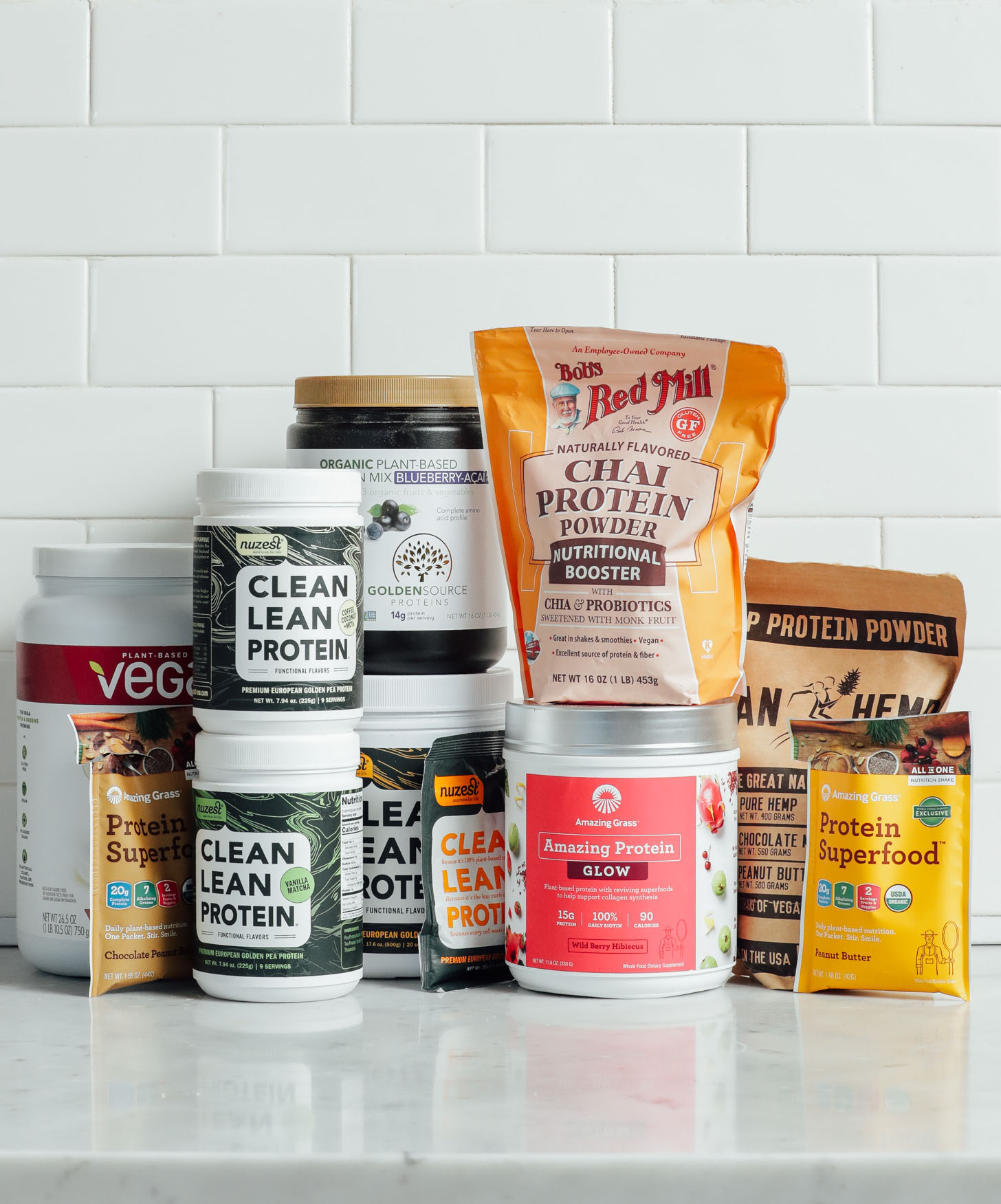 Assorted protein powders for our plant-based flavored protein powder review