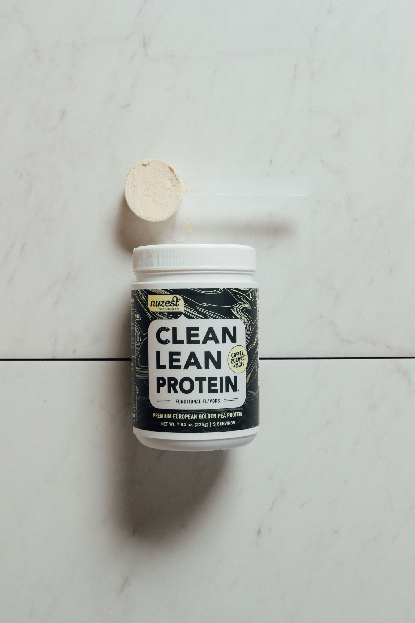 Tub of Nuzest Coffee Coconut Protein Powder for our review