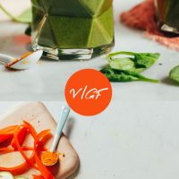 Glasses of our Warming Winter Smoothie recipe beside ingredients used to make it