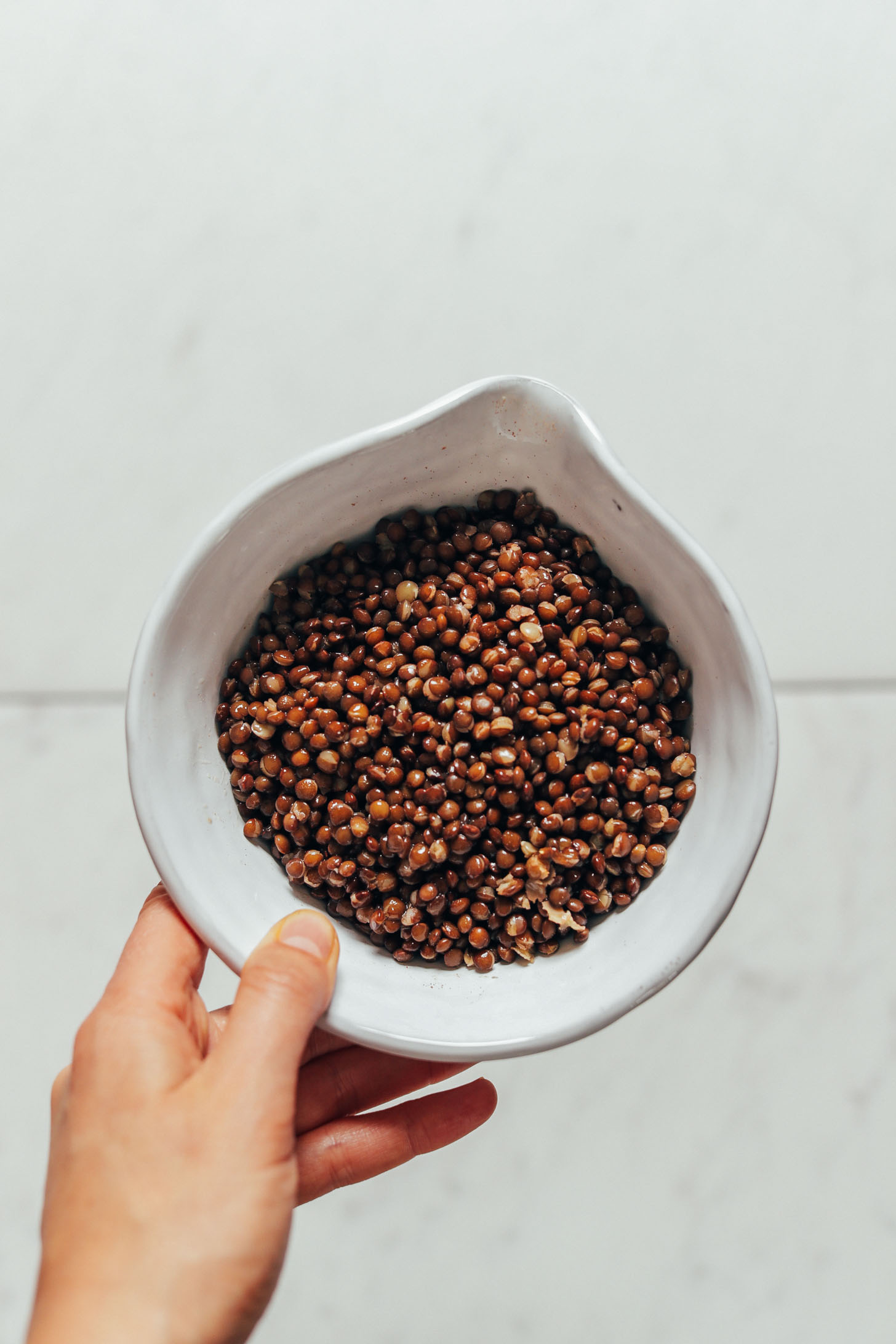Bowl of cooked lentils for making our Smoky Refried Lentils recipe