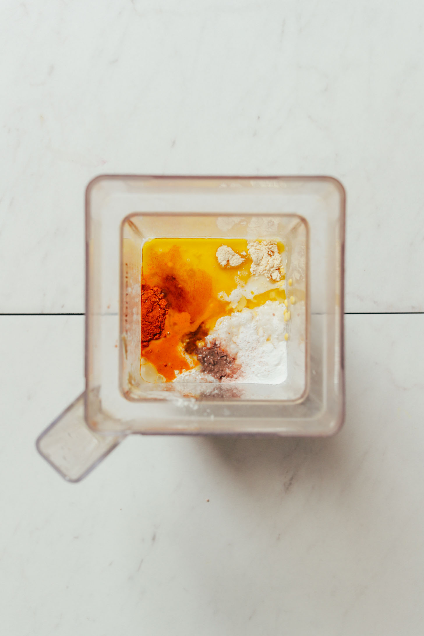 Blender filled with ingredients for making our Easy Vegan Frittata recipe