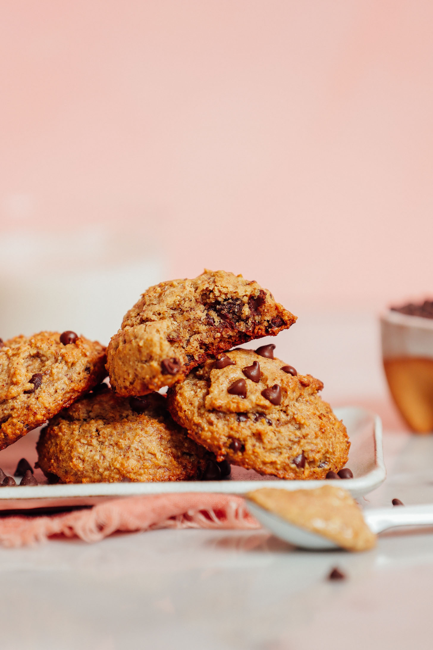 Plate of Banana Chocolate Chip Cookies with the top cookie partially eaten
