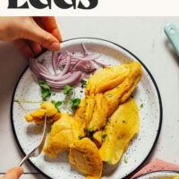 A plate of our Fluffy Vegan Scrambled Eggs that are a Just Egg dupe