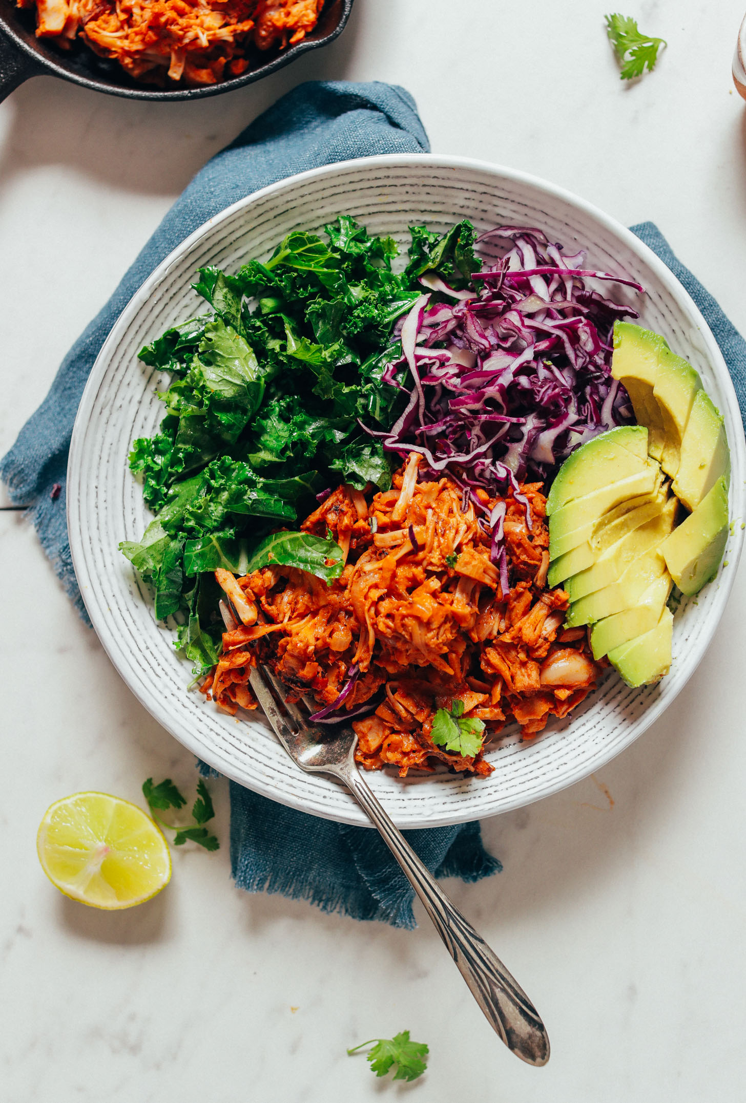 Bowl with kale, cabbage, avocado, and vegan Smoky Marinated Jackfruit