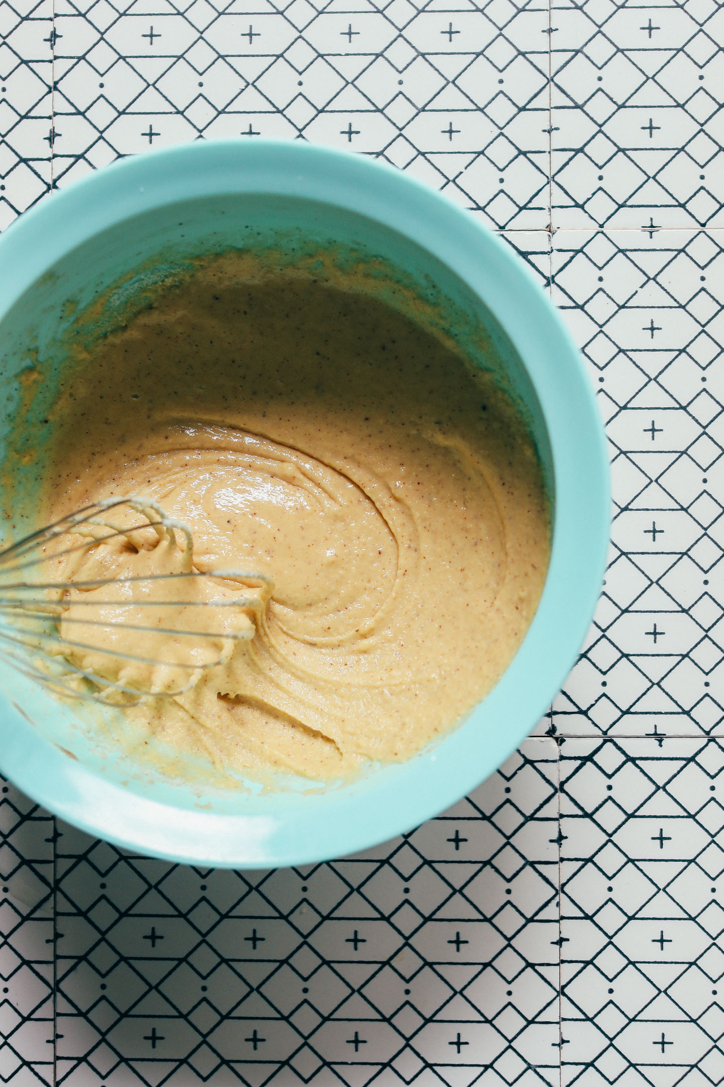 Whisking a bowl of fluffy Grain-Free Pancake batter