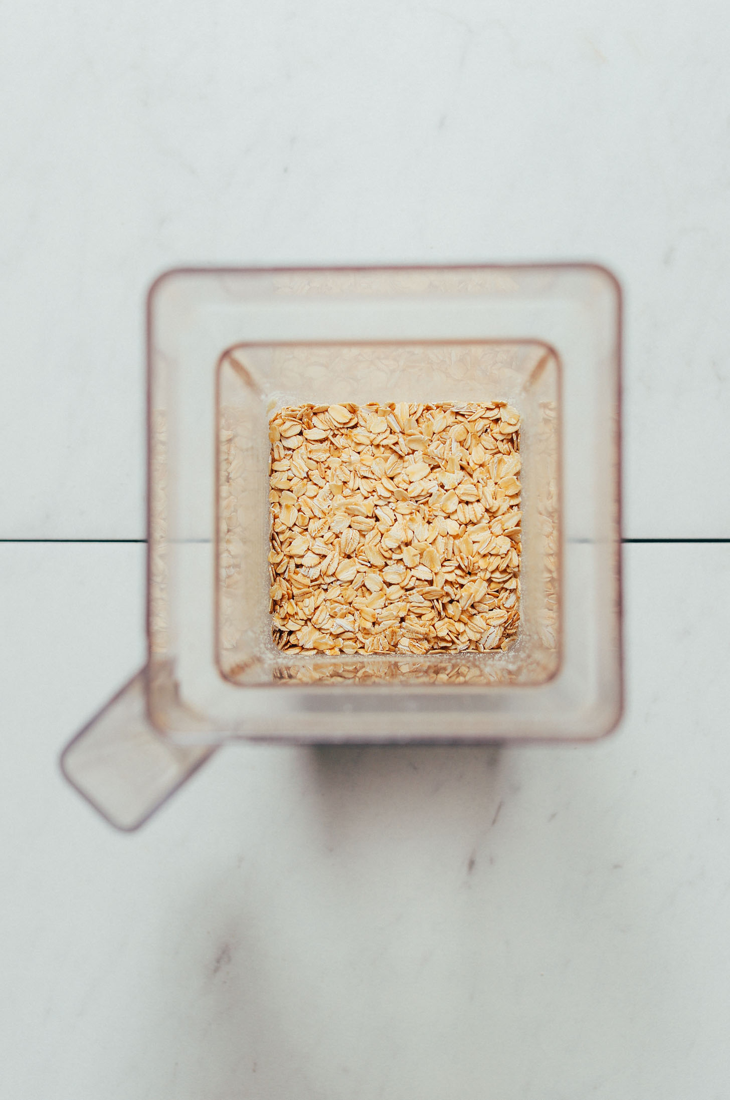 Blender of rolled oats for making homemade oat flour