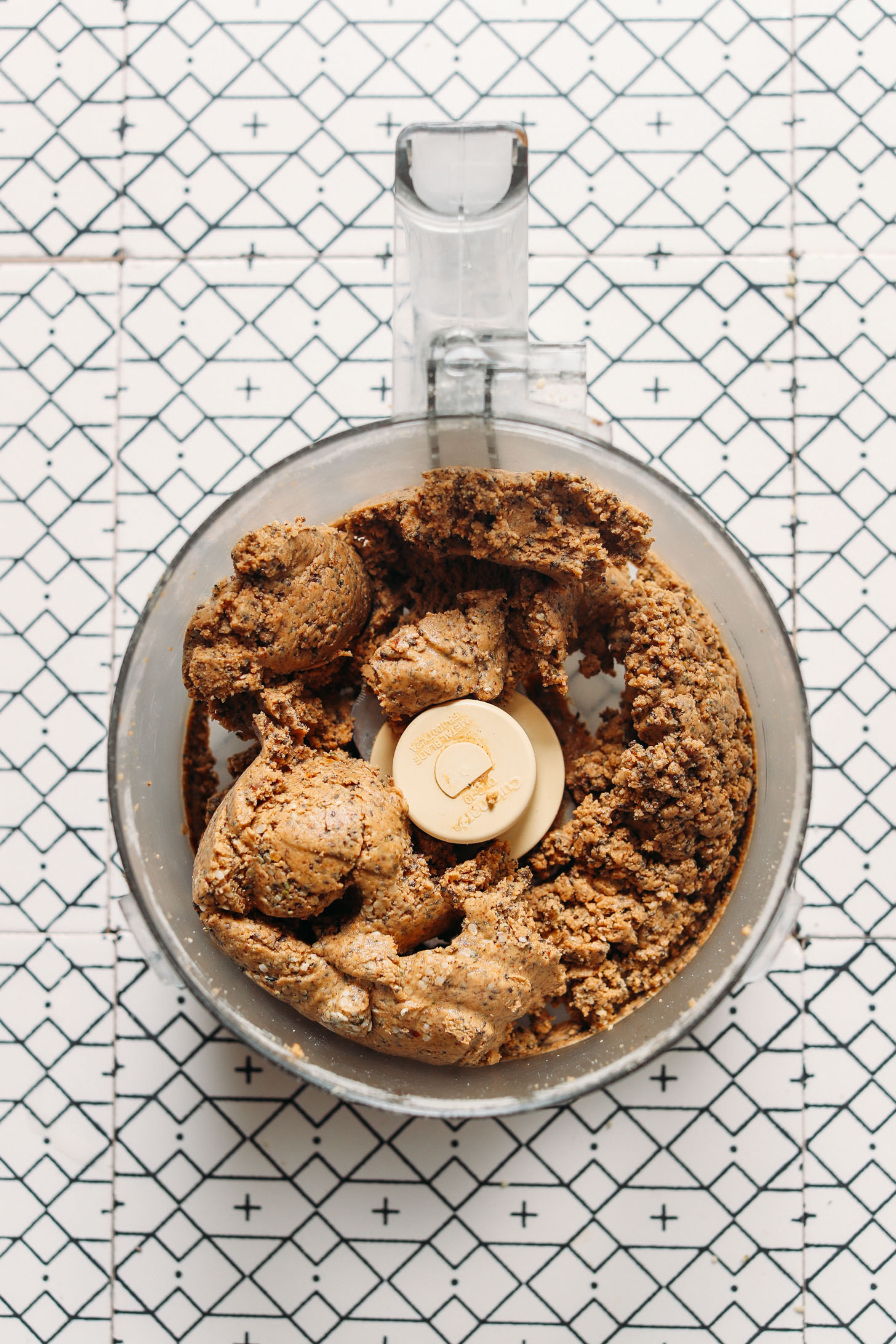 Food processor with freshly processed dough for our simple Protein Balls recipe