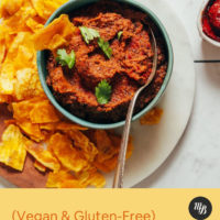 Bowl of refried lentils next to plantain chips