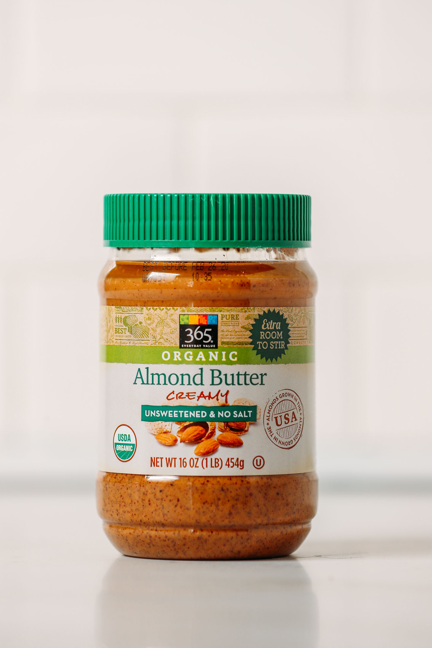 Jar of Whole Foods 365 Organic Almond Butter for our review of popular conventional and organic almond butter brands