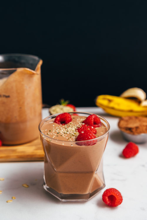 Geometric glass and measuring glass of our Chocolate Protein Shake made without protein powder