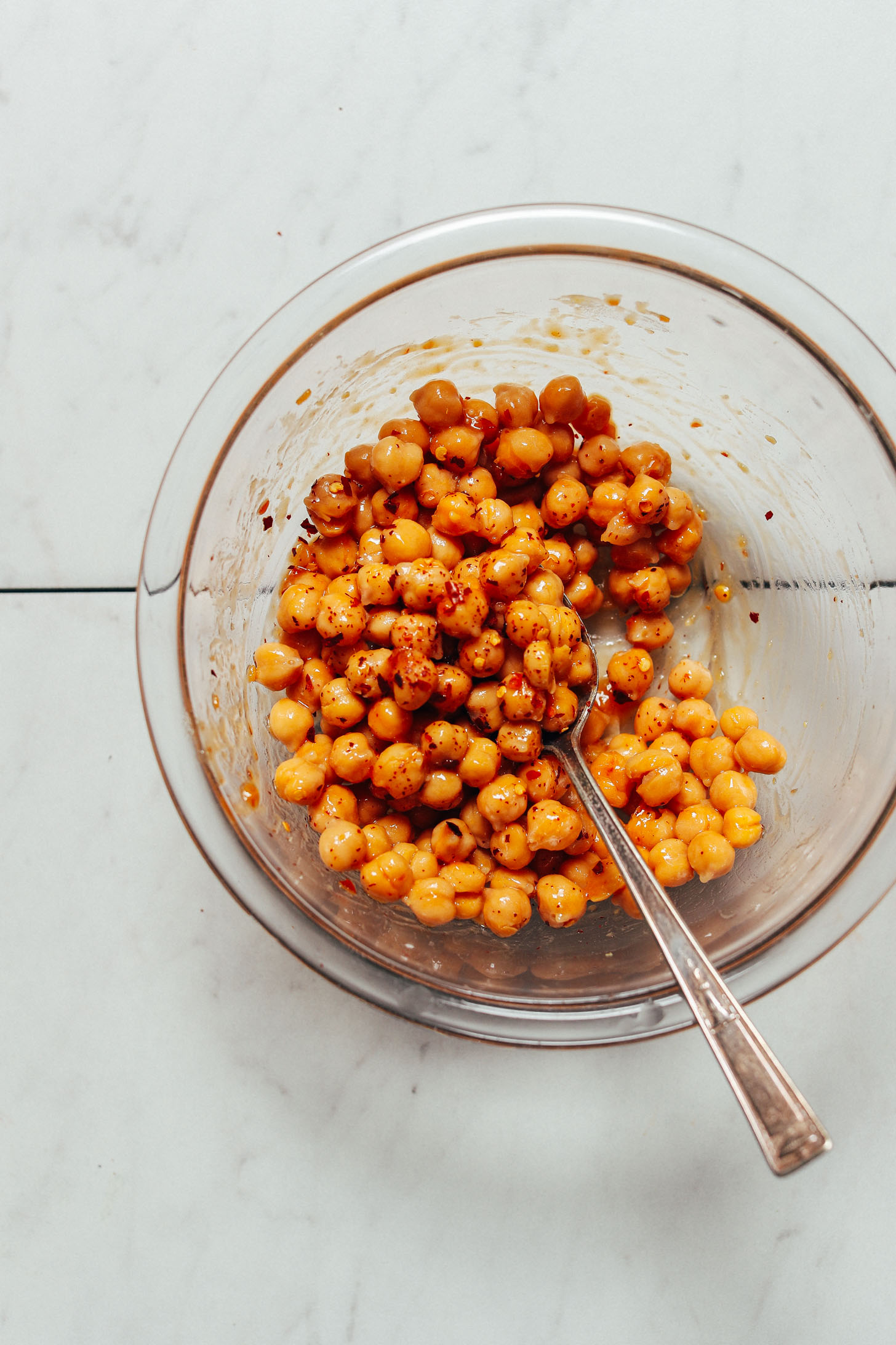 Stirring seasonings with chickpeas to make Miso Chickpeas