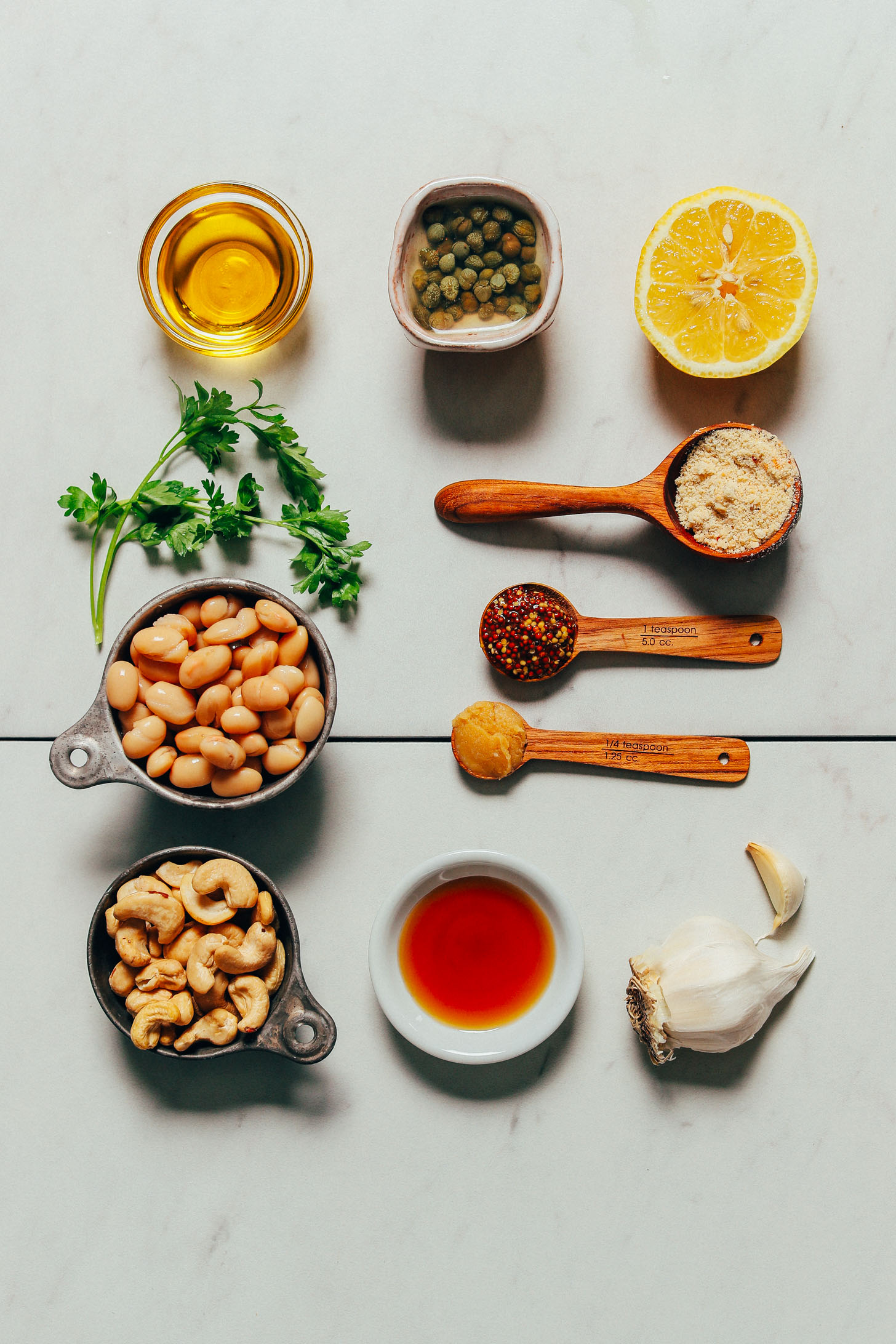 Assortment of ingredients for making our Grilled Romaine Salad with Lemon Herbed Beans and Quick Caesar Dressing