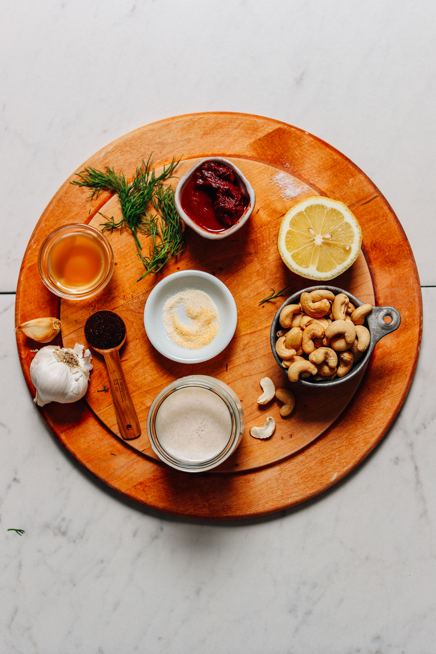 Cutting board with ingredients for making our easy Vegan Chipotle Ranch Dressing recipe