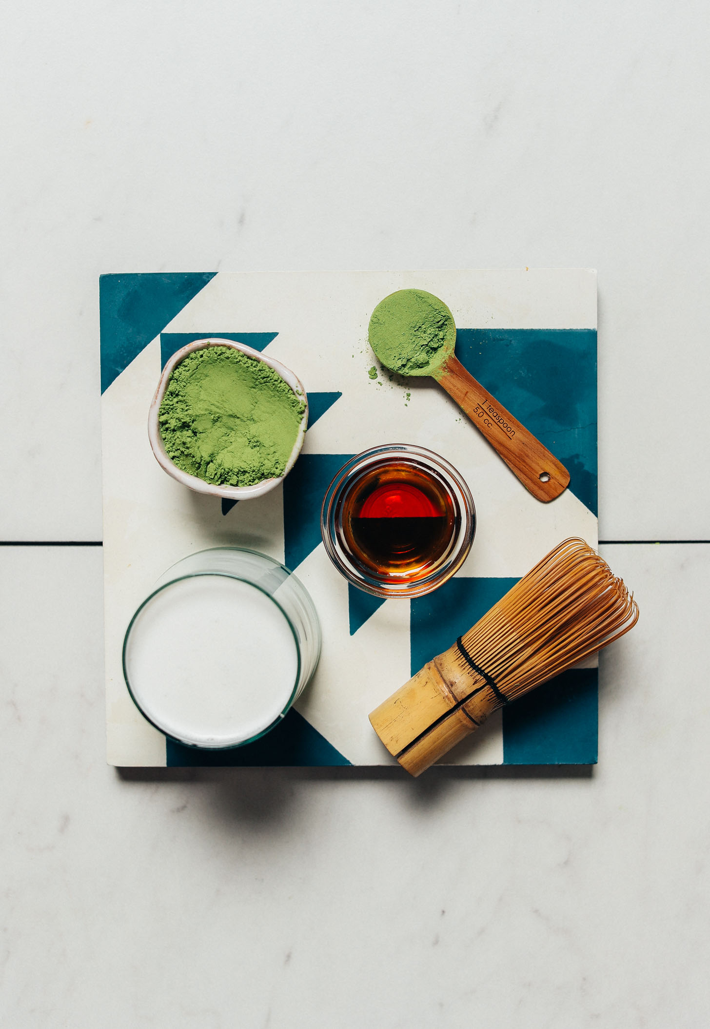 Tile with ingredients for making our creamy plant-based Moringa Latte recipe