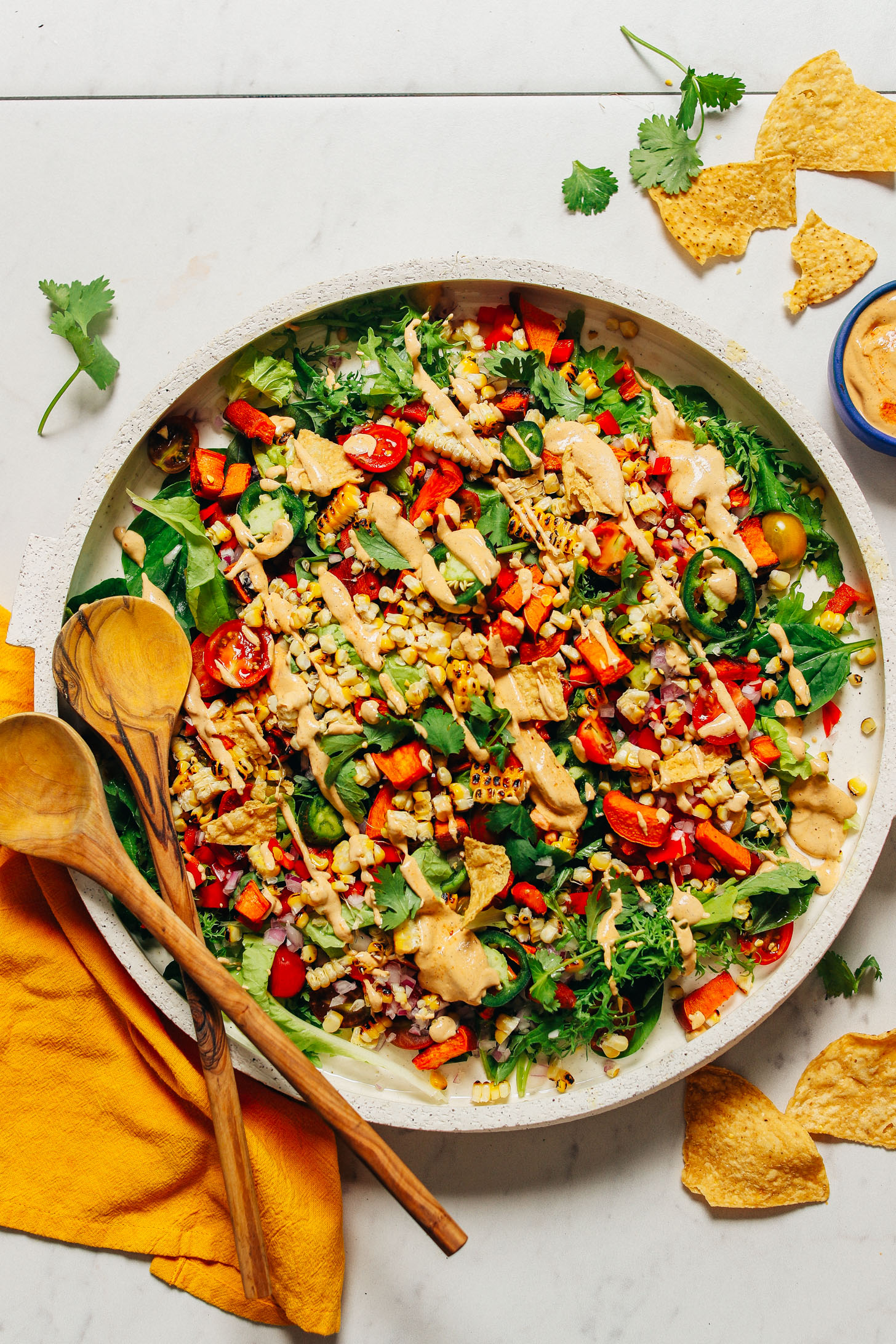 Large platter filled with Grilled Corn Salad with Vegan Chipotle Ranch