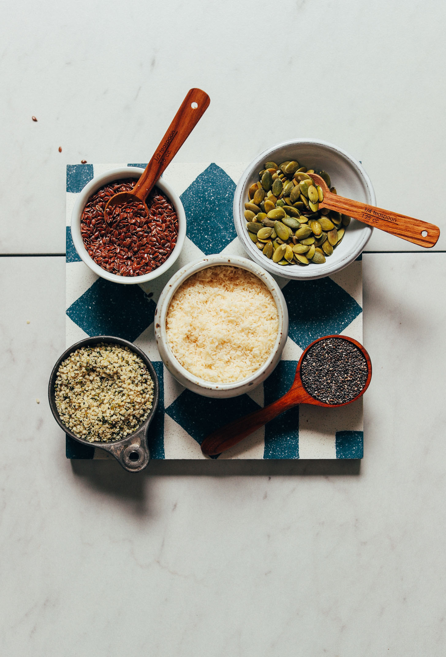 Bowls of seeds for making seed cycling mixes for the follicular phase