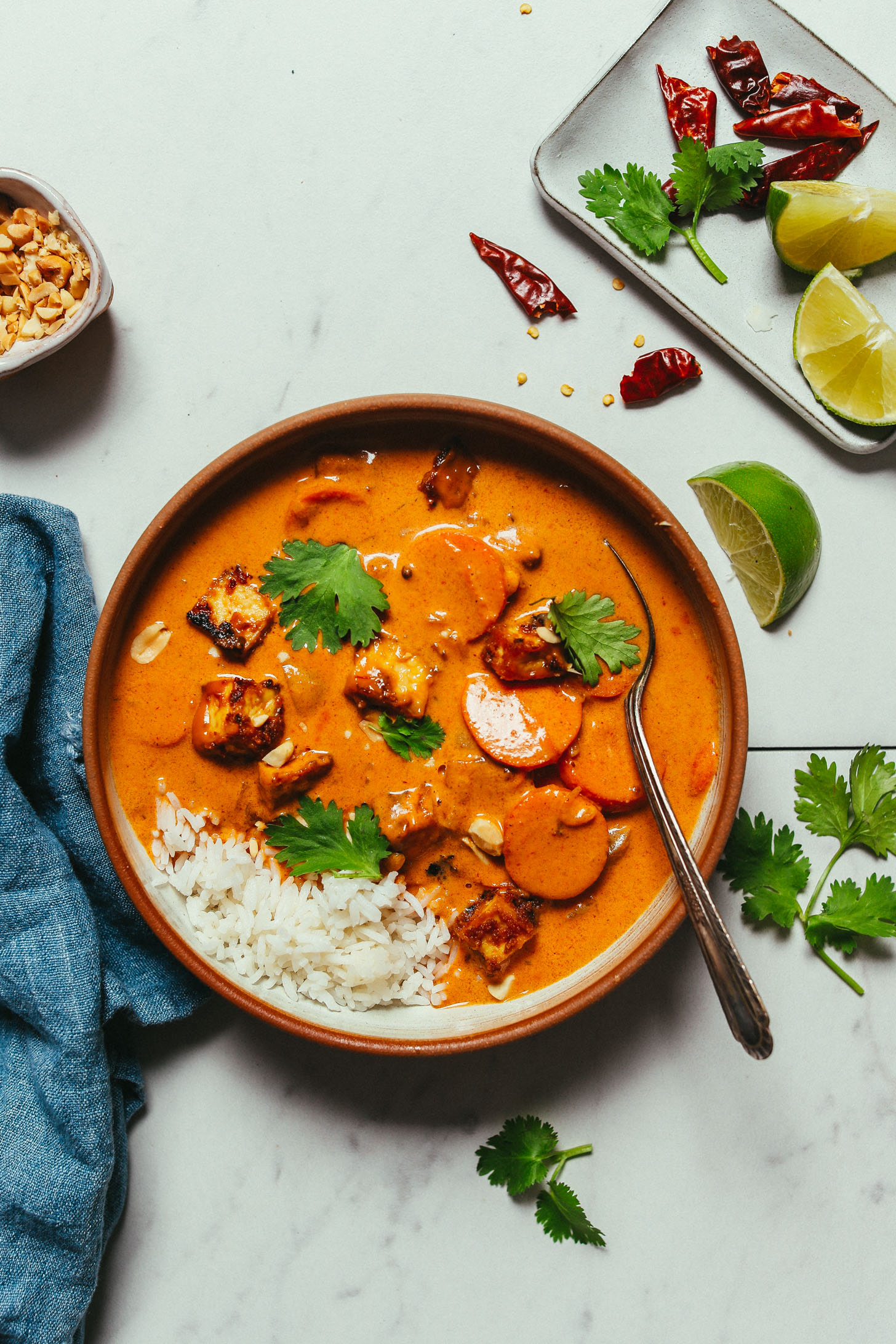 Bowl of rice and Massaman Curry with tofu for a delicious vegan meal