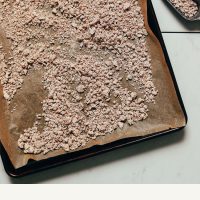 Tray of almond meal made from almond pulp for our 12 Easy Almond Pulp Recipes Roundup