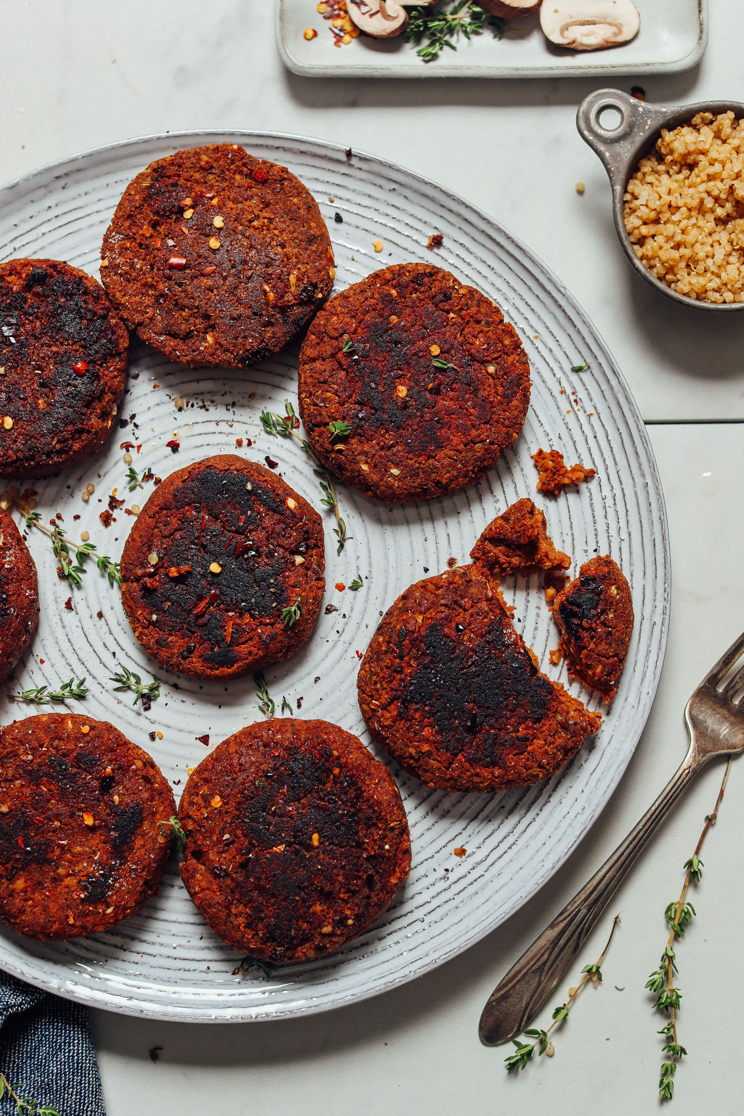 Plate of Veggie Sausage patties with one broken apart