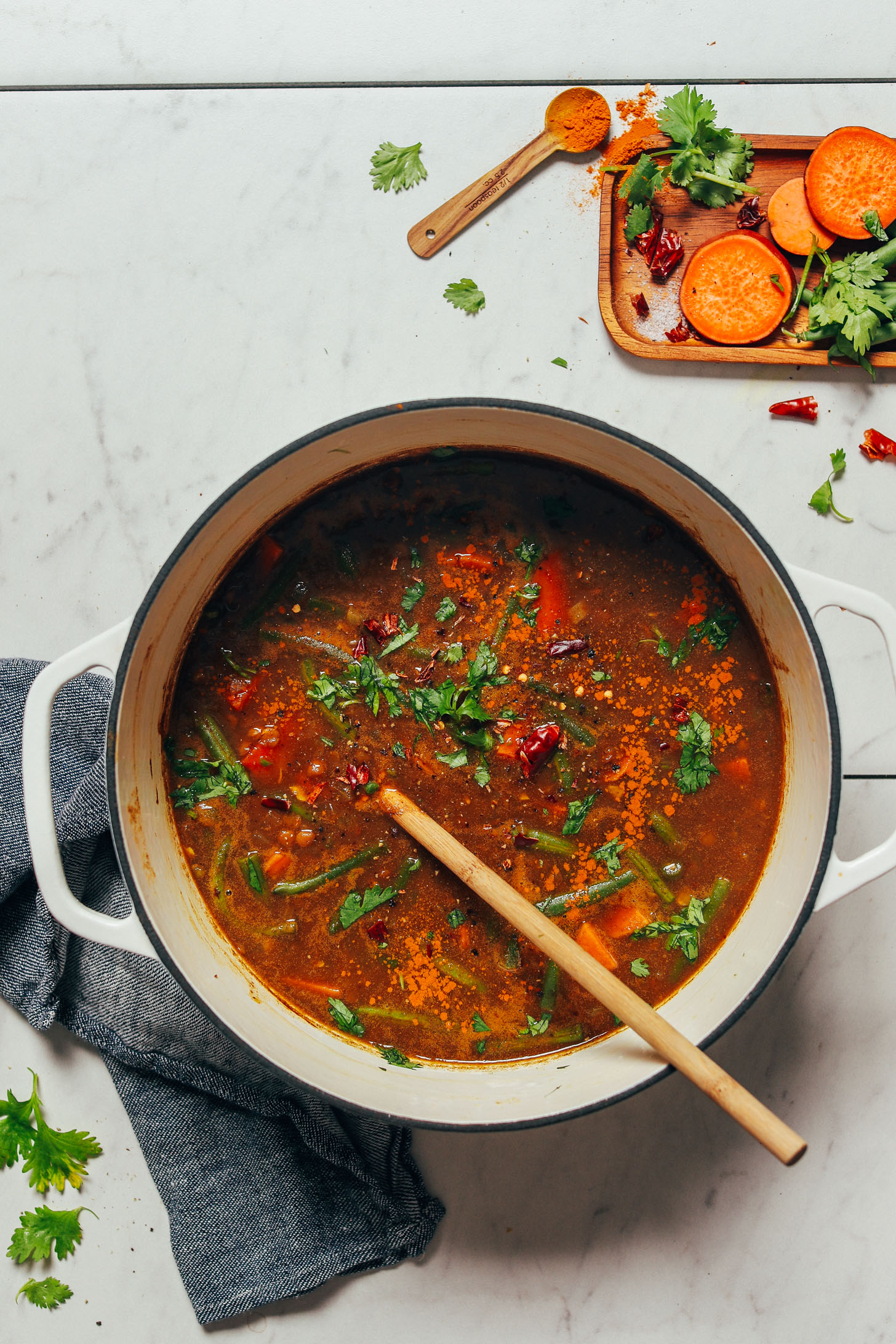 Freshly parsley sprinkled over a pot of our Spiced Sweet Potato Lentil Soup recipe
