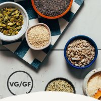 Bowls of various seeds for making Seed Cycling Mixes