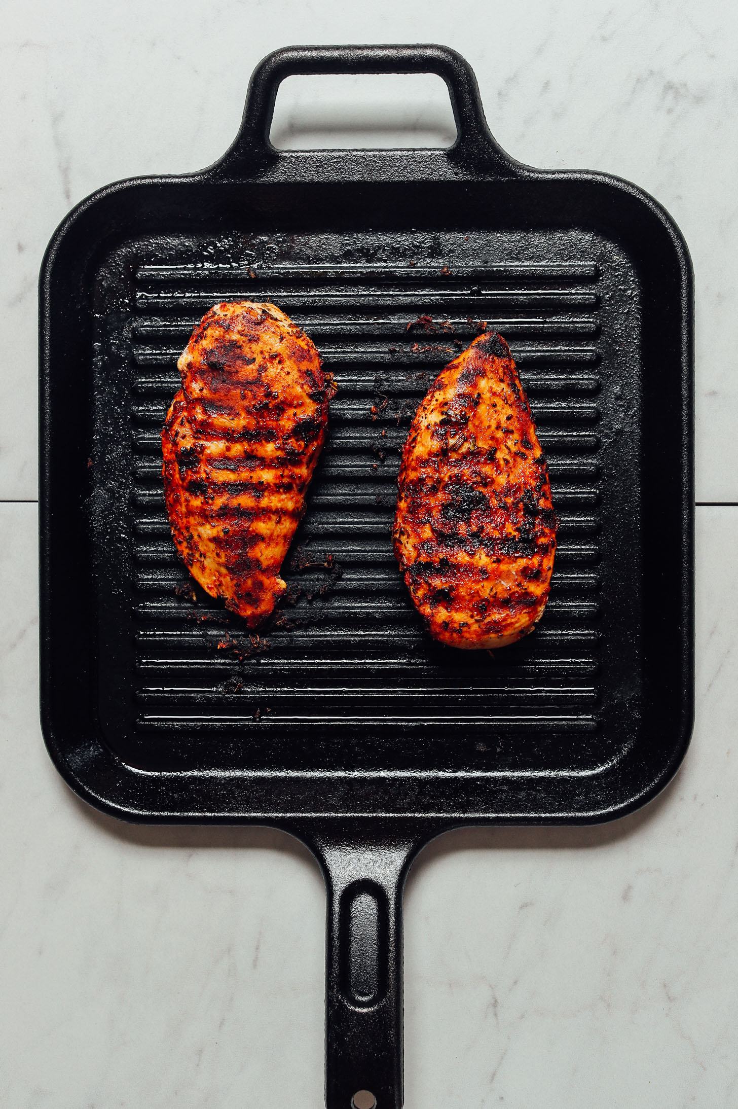 Using a grill pan to cook Marinated Grilled Chicken Breasts
