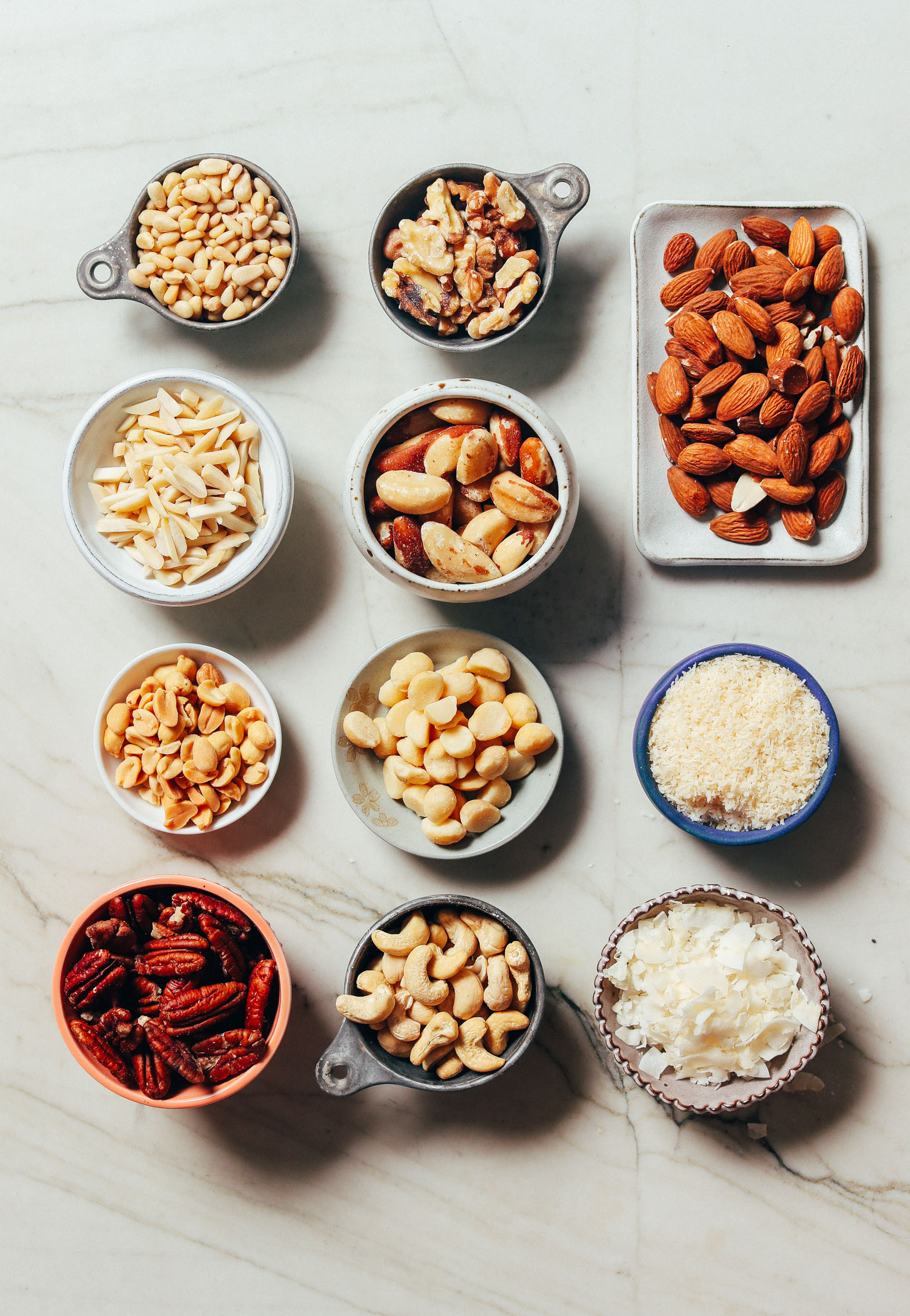 Various nuts and seeds included in our guide on How to Stock Your Pantry