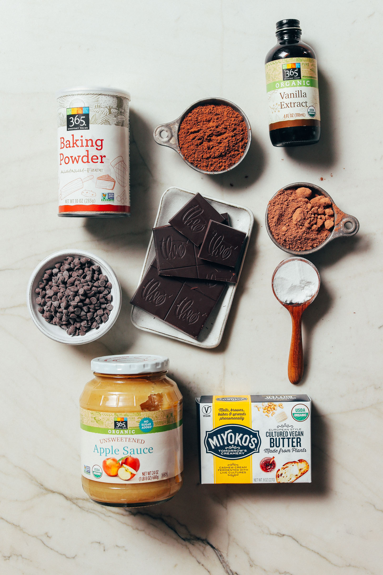 Applesauce, vegan butter, and other baking supplies for stocking a pantry for vegan baking