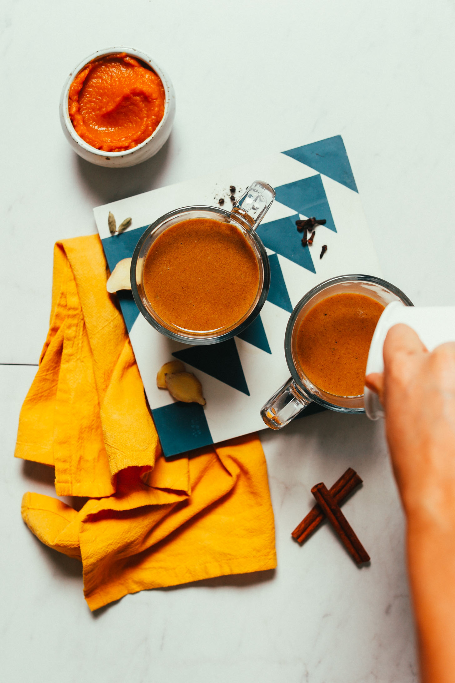 Mugs of our Pumpkin Spice Latte recipe made with real pumpkin and spices