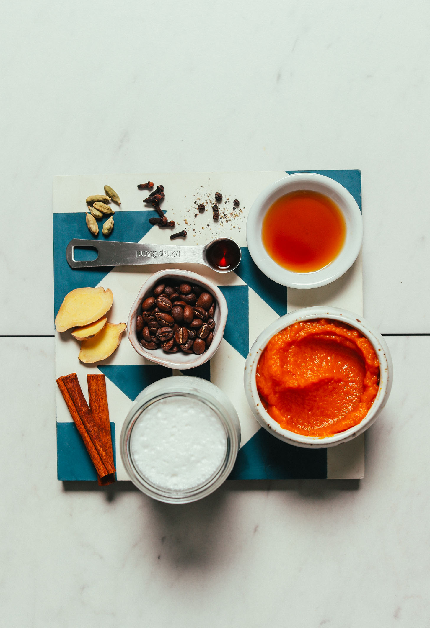 Tile with ingredients for making our easy Pumpkin Spice Latte recipe
