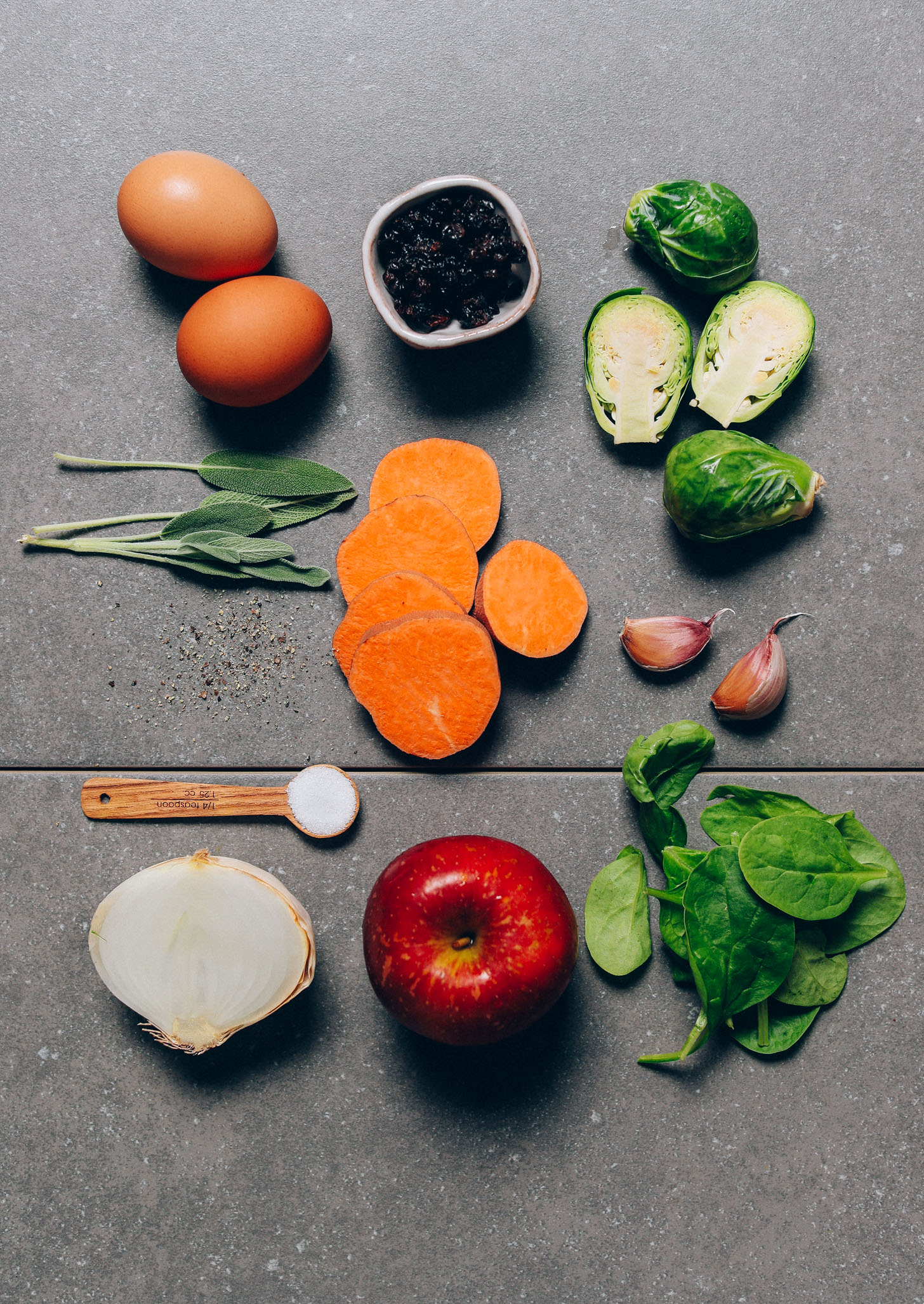 Onion, apple, brussels sprouts, eggs, and other ingredients for making our Fall Breakfast Hash recipe