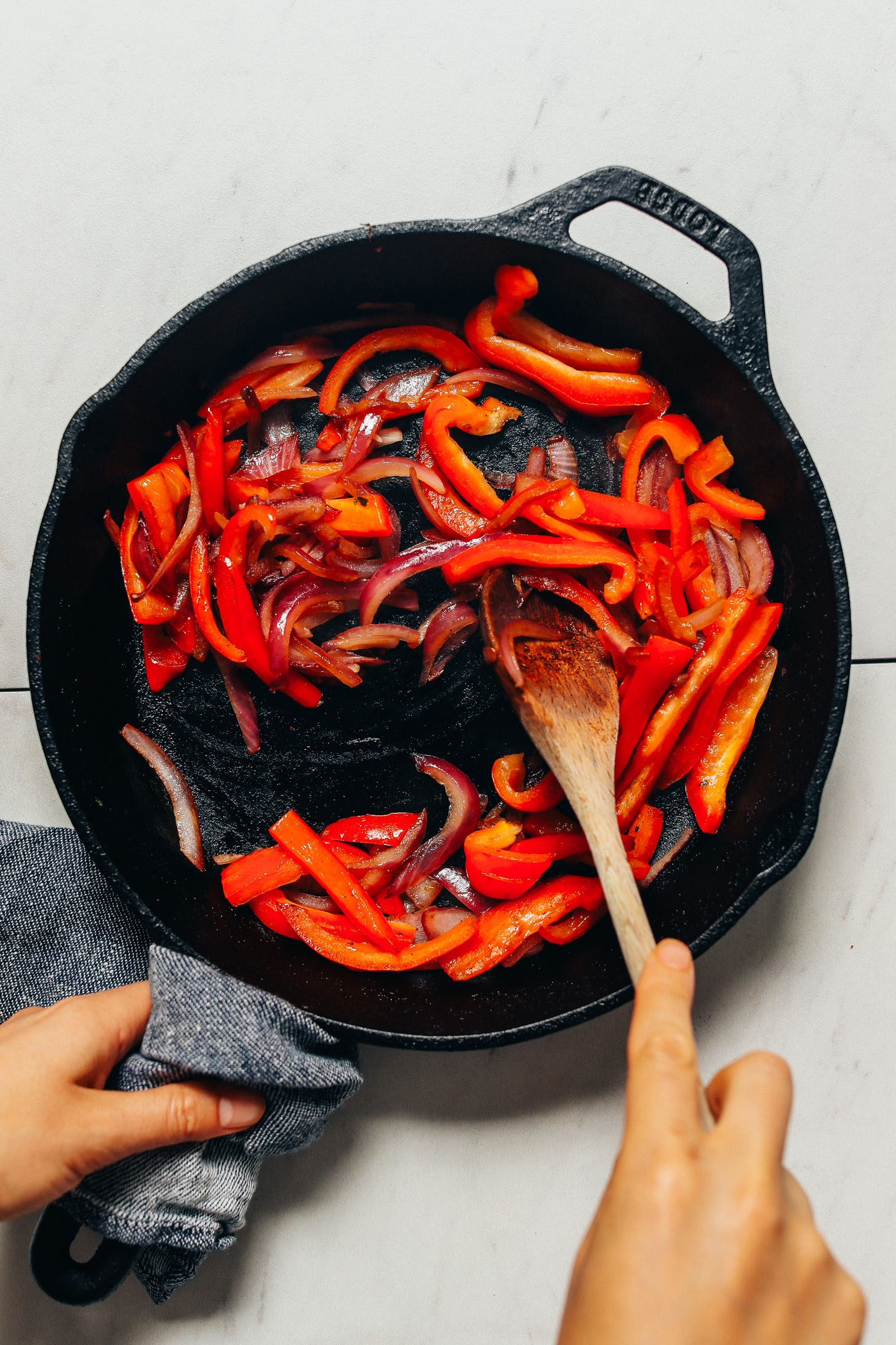 Sautéing peppers and onions for our Grain-Free Burrito Bowls recipe