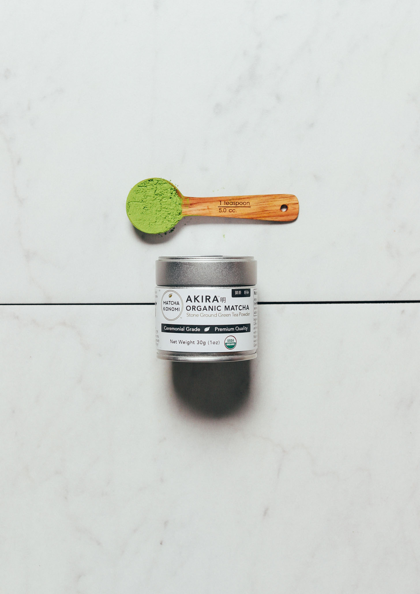 Spoonful and jar of Matcha Konomi Akira Matcha Powder for our review of the best brands of matcha