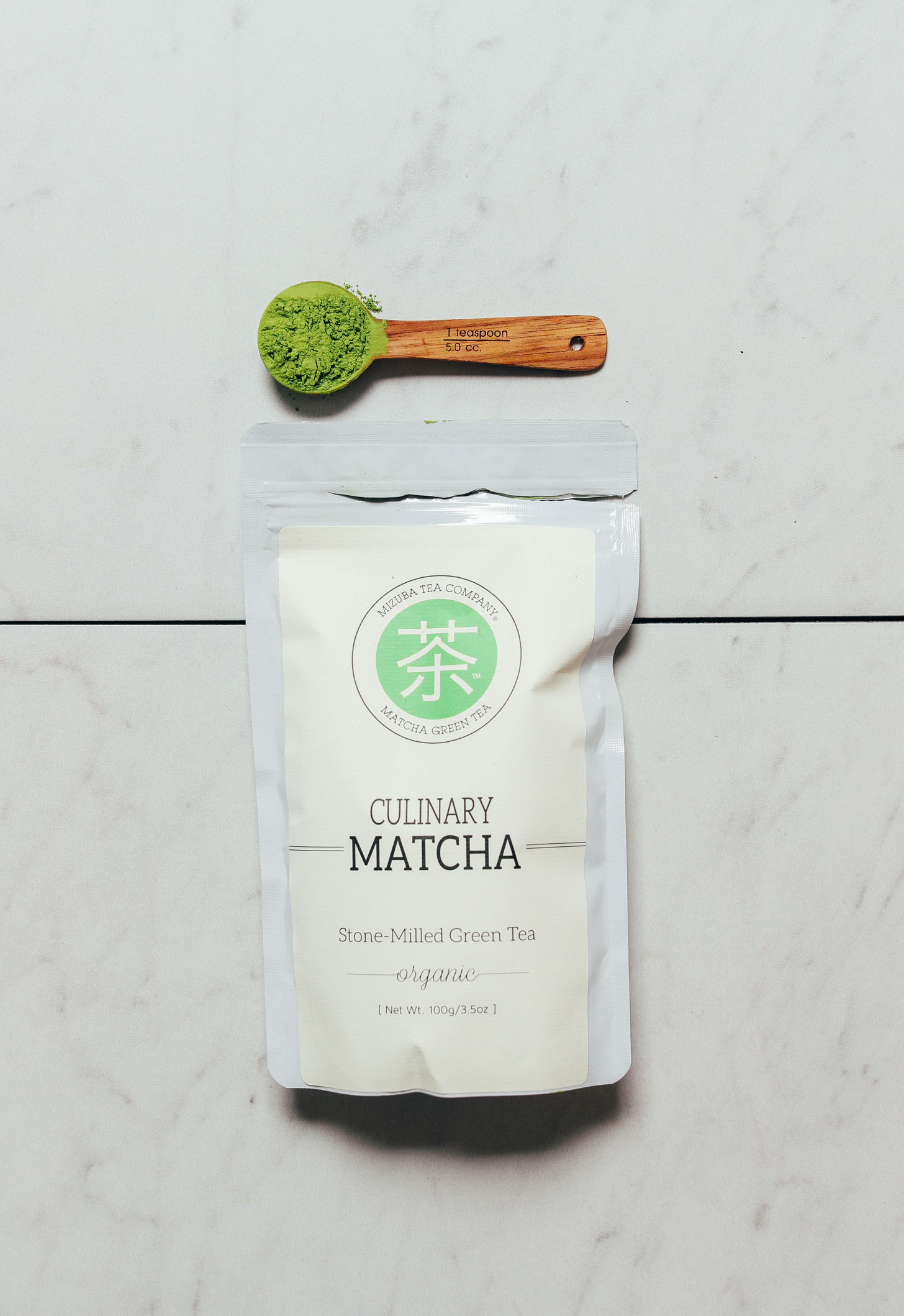 Spoonful and package of Mizuba Culinary Matcha for our review of the top matcha brands
